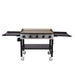 Pit Boss 5-Burner Griddle. Grill hood open with side tables extended. Black with beige and silver accents.