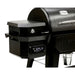 lifestyle_3, Black double grill with silver accents and white lettering with Pit Boss logo. Up close shot of pellet hopper and digital control board