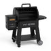 Pit Boss Competition Series 1250 Wood Pellet Gril. Black grill with silver accents. Hood open.