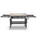 Pit Boss Deluxe 4-Burner Griddle. Both side tables open. Black grill with beige and silver accents. Front view.