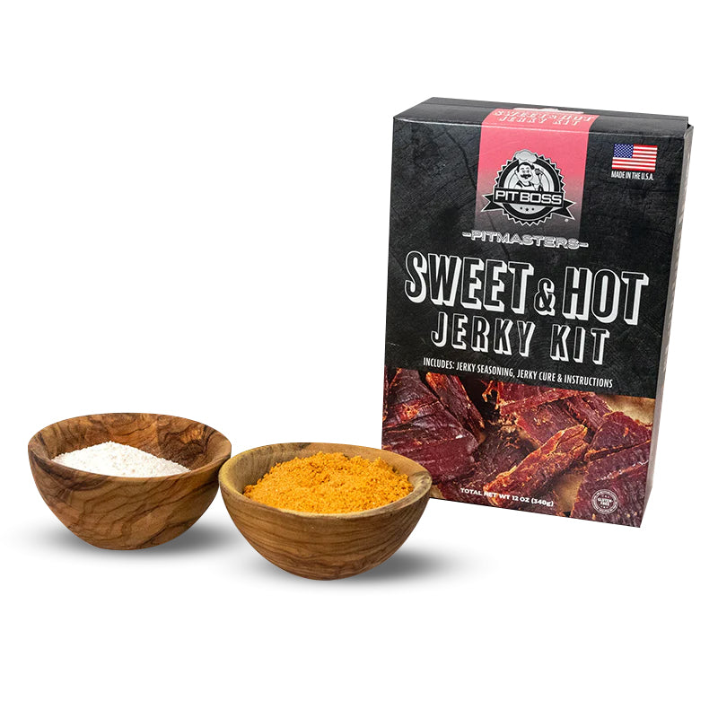 Pit Boss Sweet and Hot Jerky Kit next to seasoning.