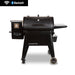 Pit Boss navigator 850 wood pellet grill with FI. Black grill with white logo and accents. Side table displayed.