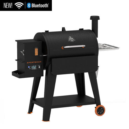 black wood pellet bbq grill with orange accents and pit boss logo on grill barrel. now with wifi and bluetooth