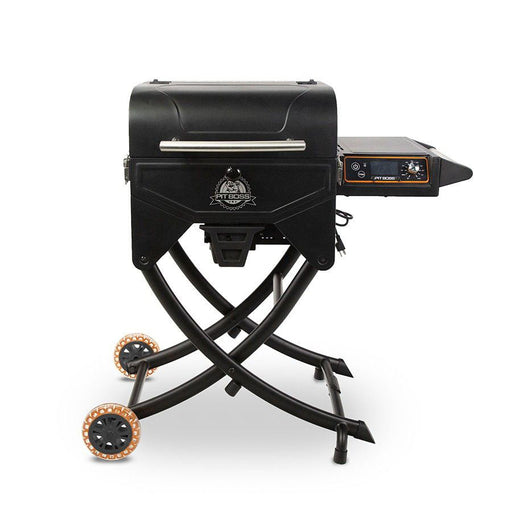 Pit Boss Sportsman Portable Wood Pellet Grill. Black with orange accents. Side table out.