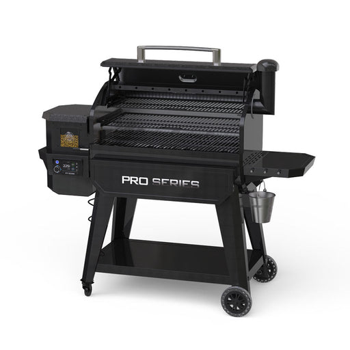 Black grill displayed with side profile. Open grilling hood. Pellet hooper and side table displayed