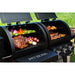 lifestyle_4, Black grill with silver accents and Pit Boss logo and lettering. Up close of meats and veggies grilling on grates