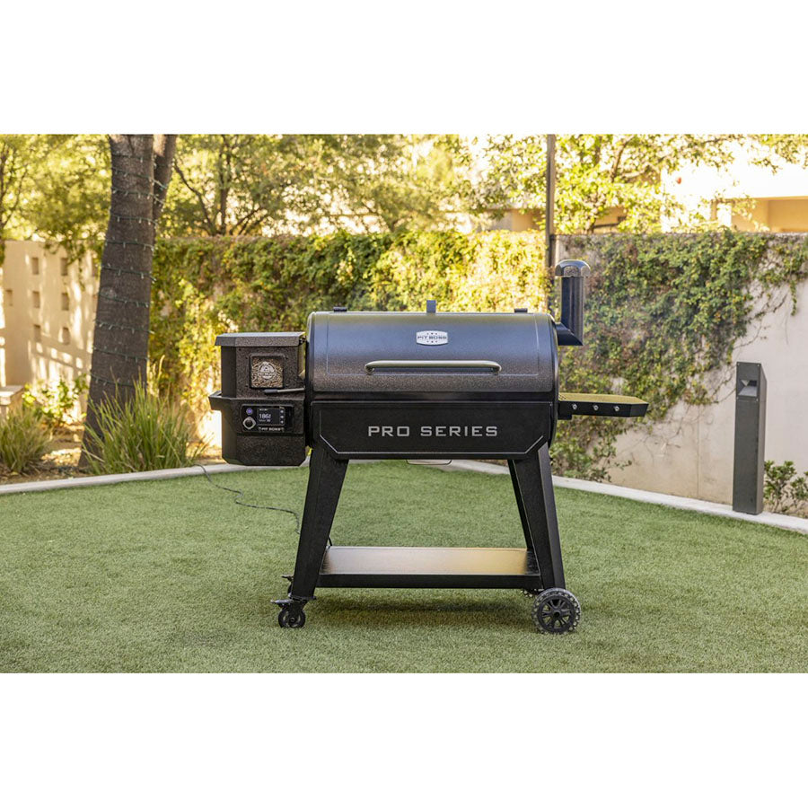 Pit Boss Pro Series 3 1150 Wood Pellet Grill outside in yard. Front view.