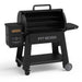 Pit Boss Competition Series 1600 Wood Pellet Grill. Black with silver accents. Pit Boss engraved into the front. clear wheels. Open hood.