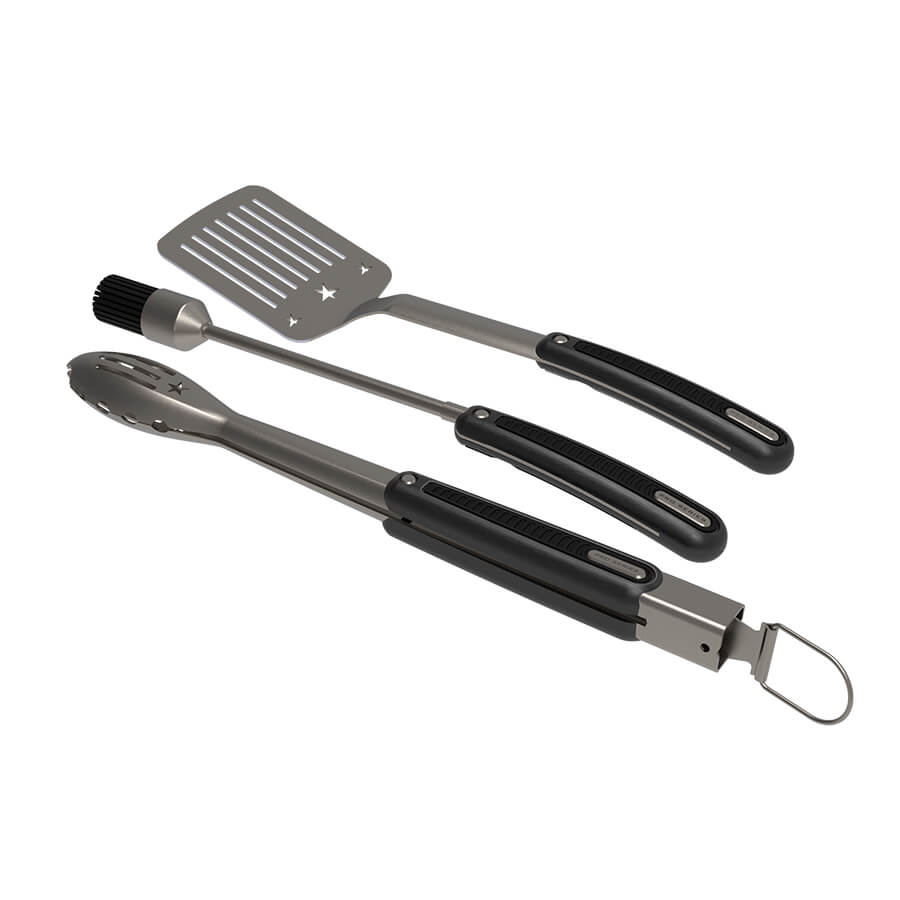 Pro Series 3 Piece Stainless Steel Tool Set. Silver tools with black handles. Stars engraved on tools. Includes: locking tongs with hanging loop, spatula, silicone basting brush