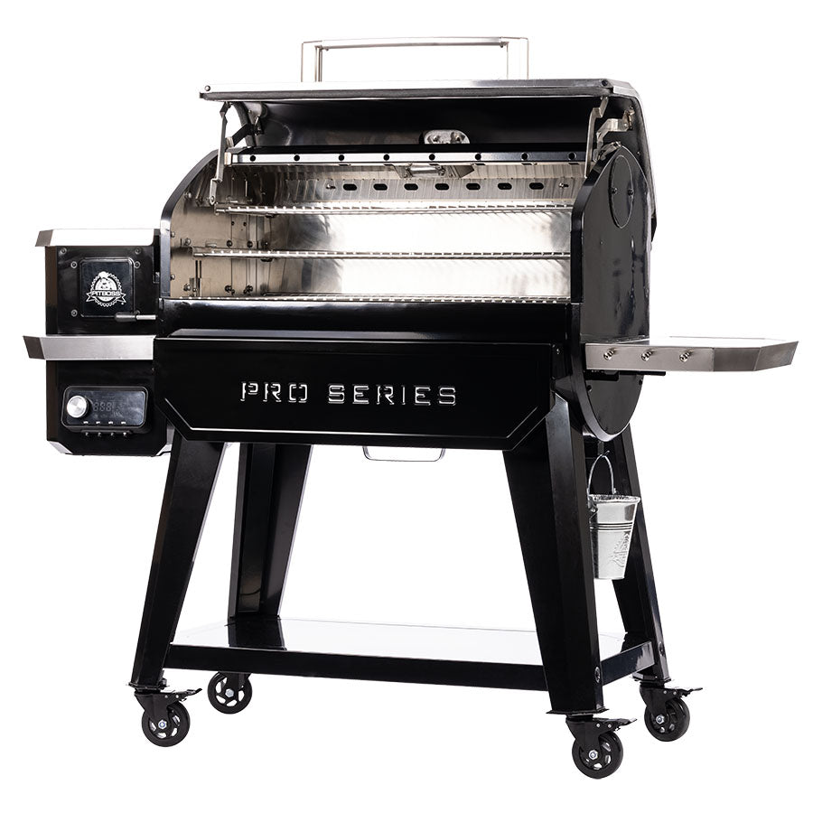 Pit Boss Pro Series 1600 Elite. Black grill wth silver accents. Side view displayed. Open hood. Pro Series engraved in grill.