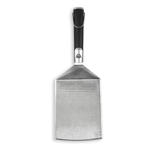 lifestyle_1, Soft Touch Spatula. Black handle with silver spatula and small pit boss logo. Front view